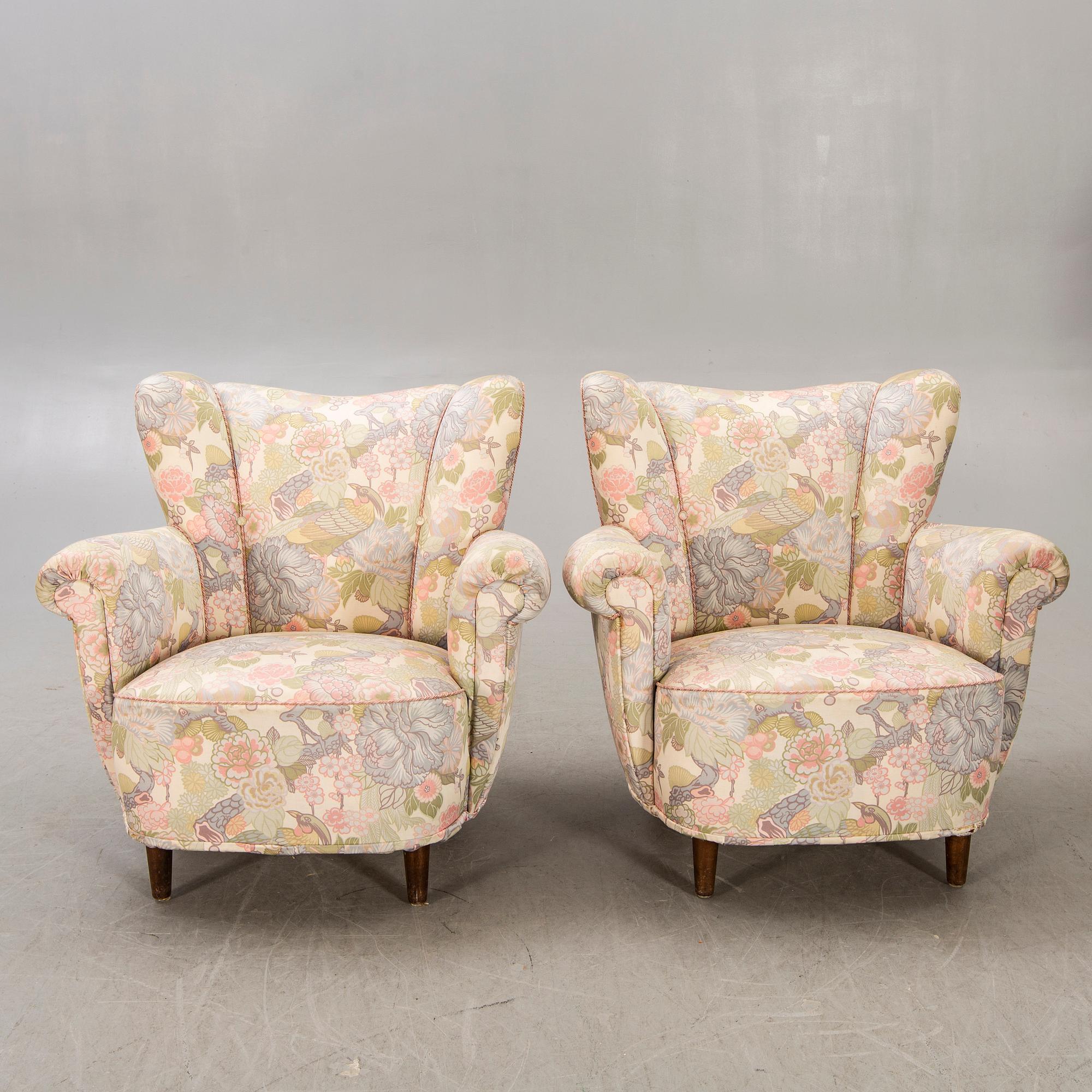A pair of 1940s easy chairs.