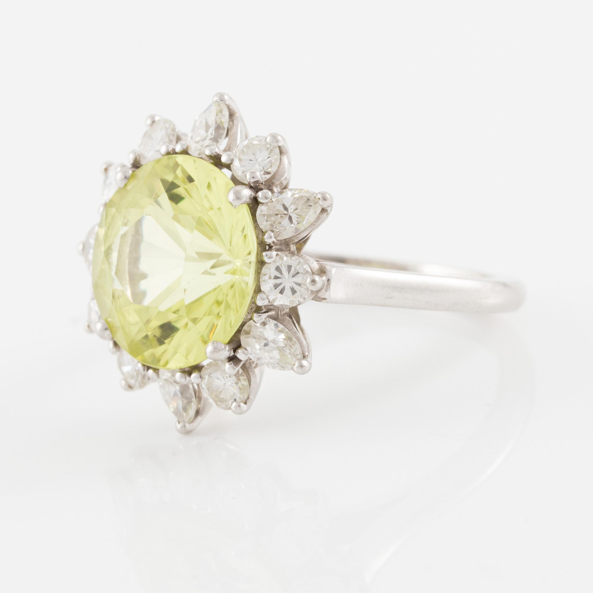 Ring, in the form of a flower, platinum with chrysoberyl and drop-cut and brilliant-cut diamonds.