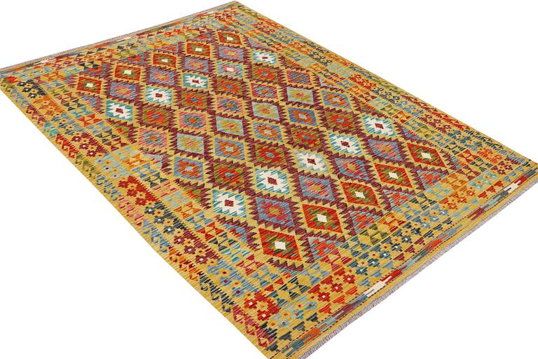 A Kilim rug, c. 240 x 181 cm.
