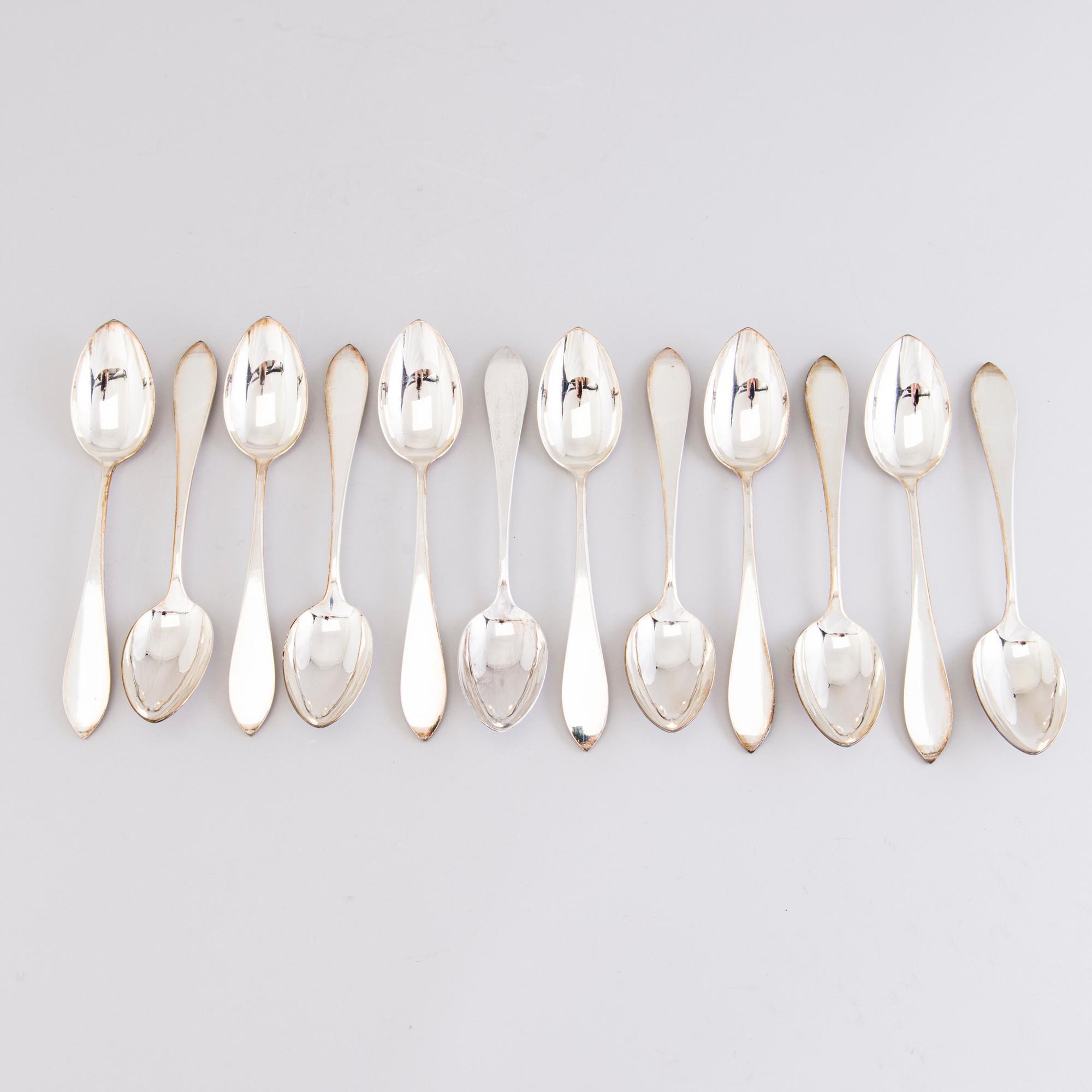 A 1920s 88-piece set of silver cutlery and 12 knife handles, Warsaw Poland.