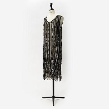 A sequin and pearl-embroidered 1920's dress.