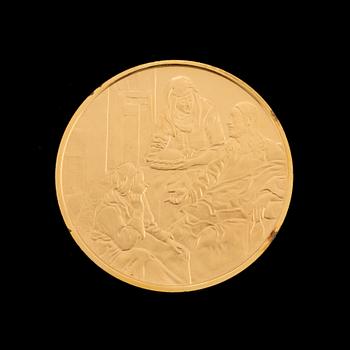 A collection of 31 gold-plated silver coins from Franklin Mint.