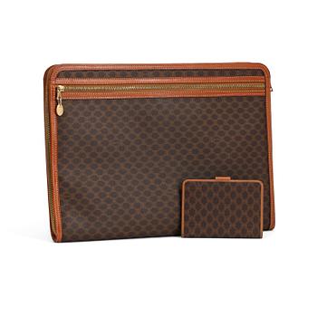 CÉLINE, a brown coated monogram canvas briefcase and wallet.