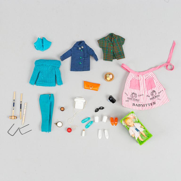 A collection of four Mattel 1960's Barbiedolls with accessories.