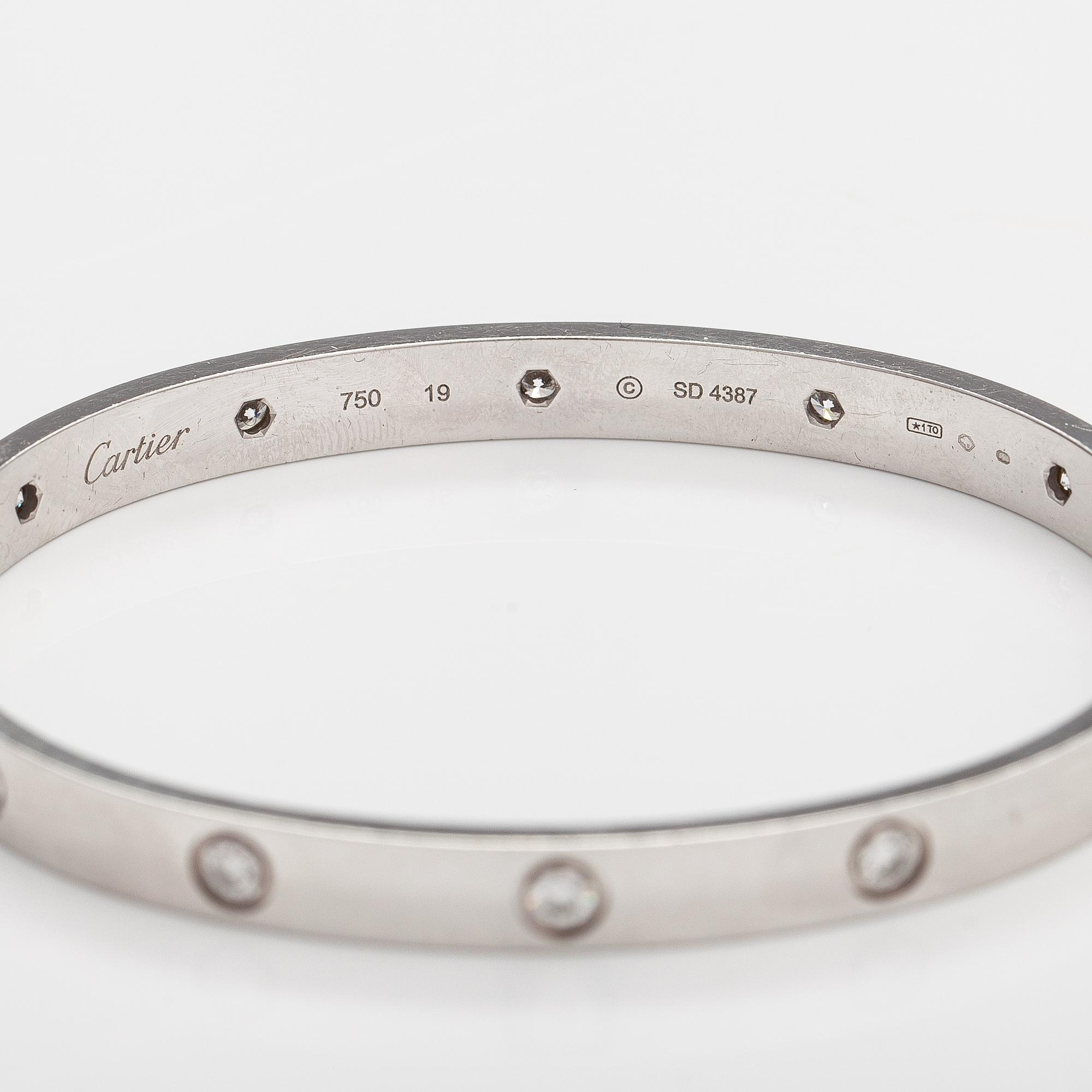 Cartier, "Love bracelet" an 18K white gold bracelet with diamonds ca. 0.96 ct in total. Marked Cartier, 19, SD4387.