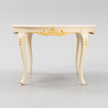 A Rococo style dining table, second half of the 20th Century.