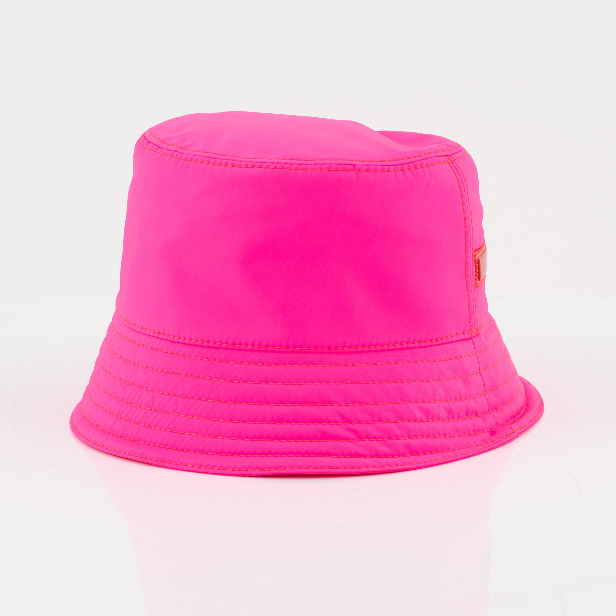 Prada a neon pink bucket hat. Bukowskis