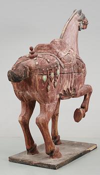 A large jade and agathe inlayed wooden carparisoned sculpture of a horse, presumably Ming dynasty.