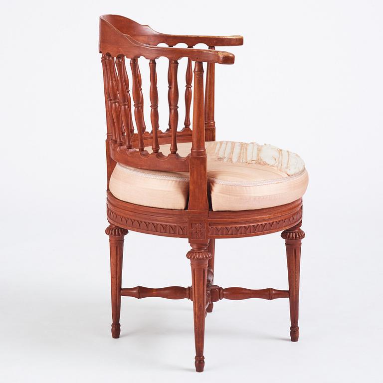 A carved Gustavian commode chair by J. Hammarström (master 1794-1812).