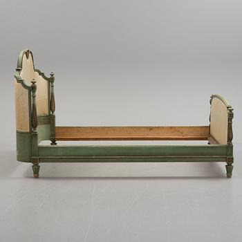 A gustavian style bed, first half of the 20th century.