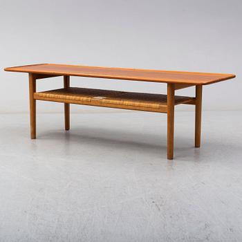 HANS J WEGNER, a teak and oak coffee table from Andreas Tuck, Denmark.