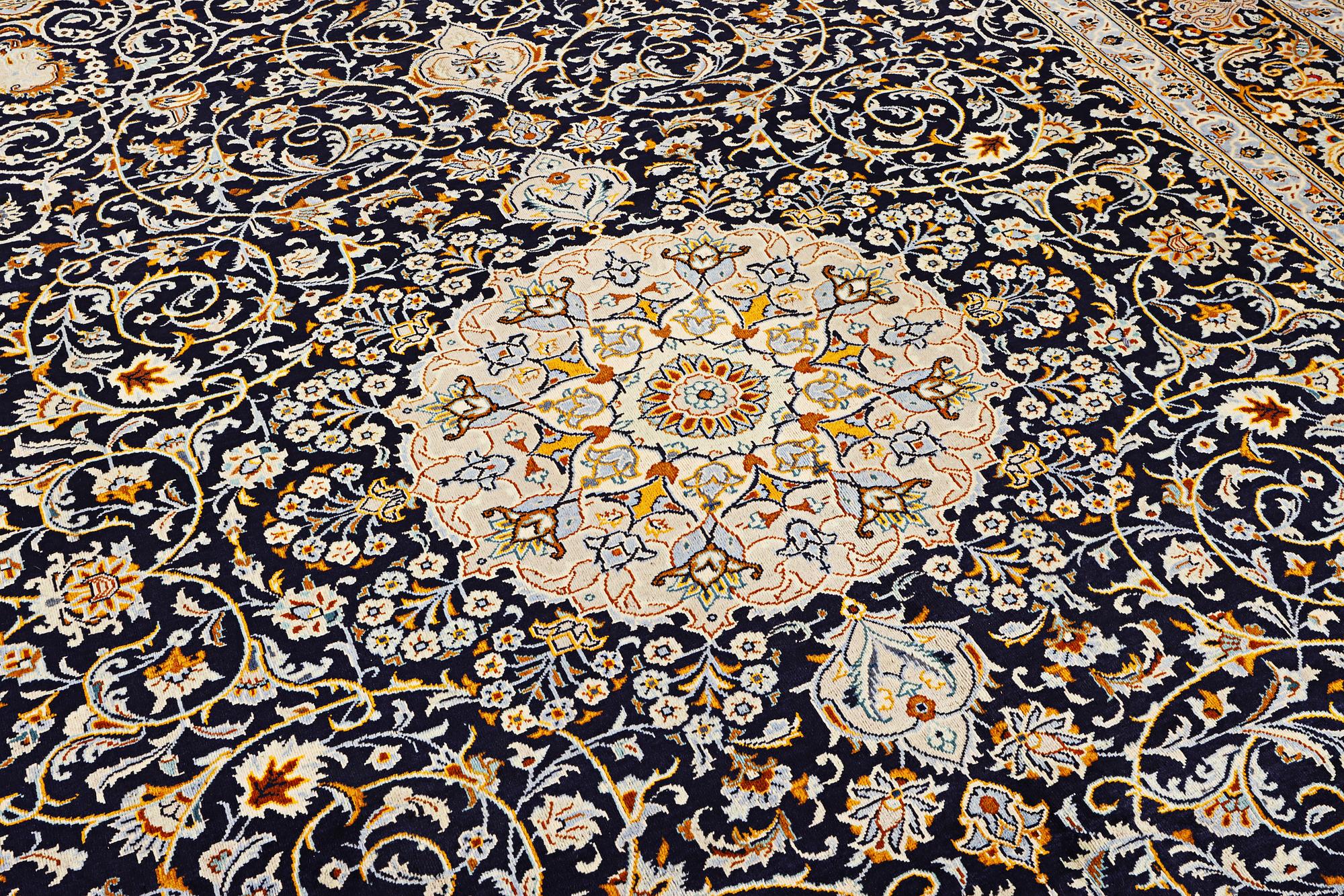 A Kashan carpet, c. 383 x 310 cm.