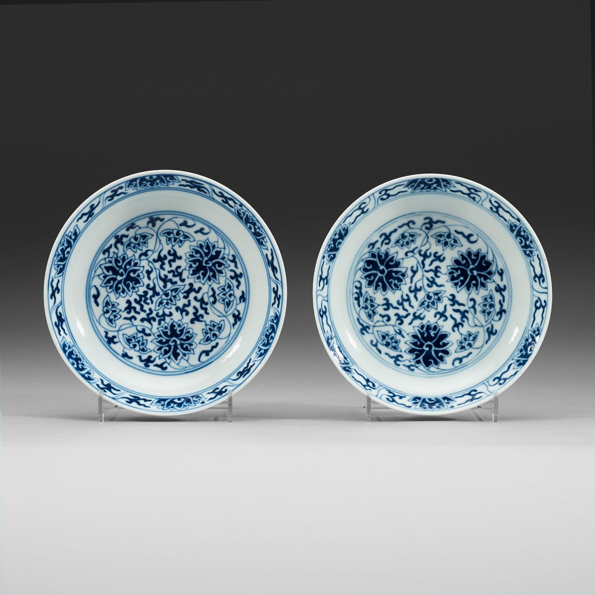 A pair of blue and white lotus dishes, Qing dynasty, Guangxu mark and of period (1874-1908).