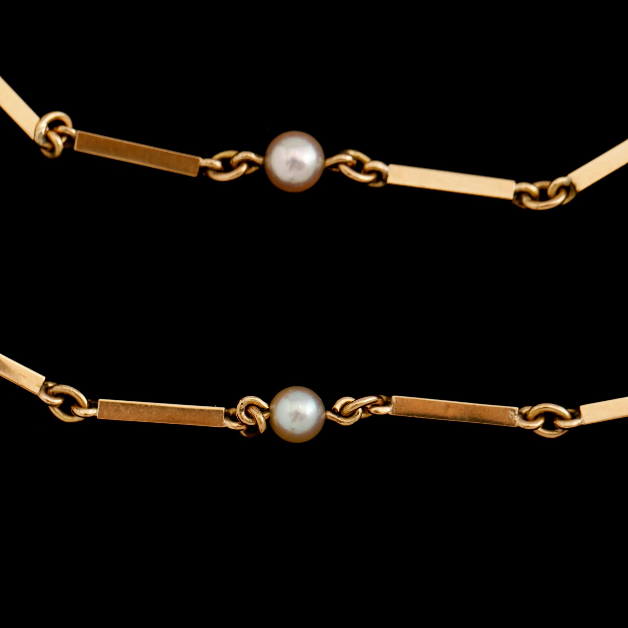 COLLIER, 18 k guld med odlade pärlor, total vikt ca 16 g.