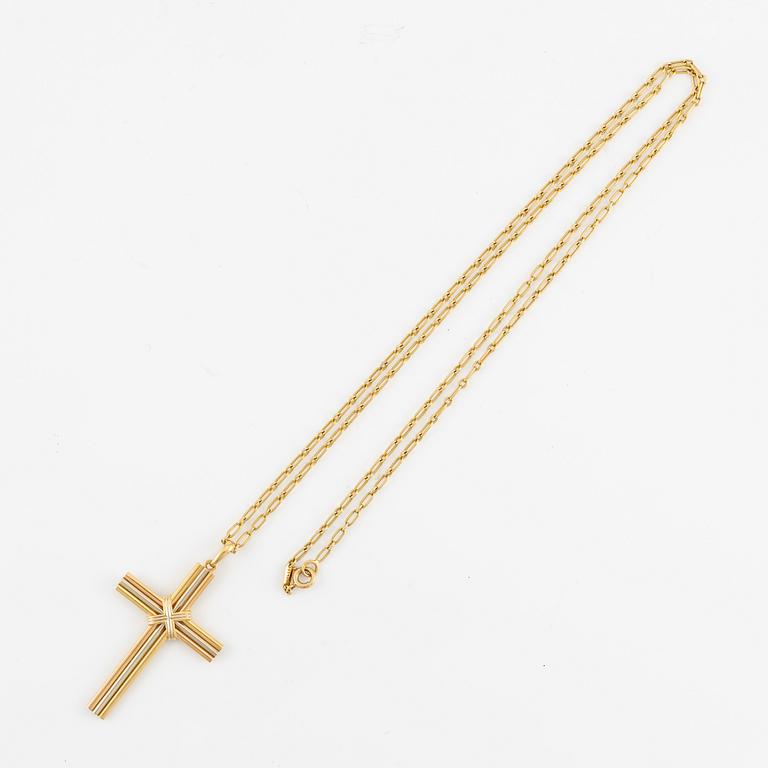 A Cartier necklace 18K multi-coloured gold "Trinity" cross.
