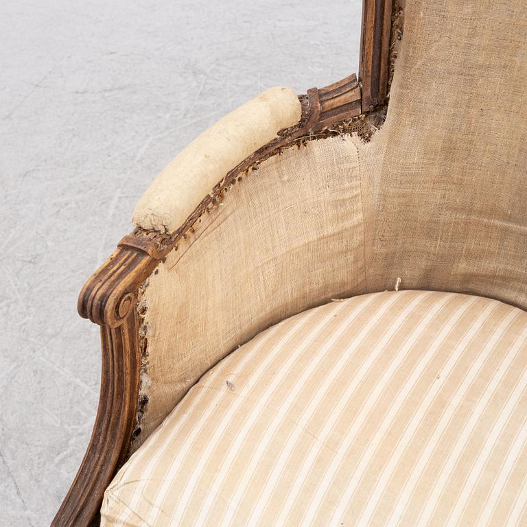 A French armchair, Directoire, early 19th century.