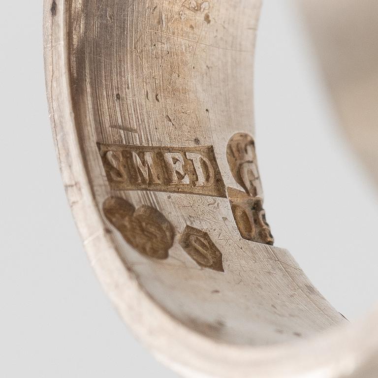 Lars Arby, fyra ringar, silver, en med tigeröga.