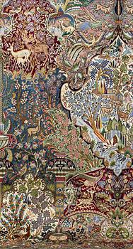 A Kashmar figural carpet. Circa 390 x 300 cm.