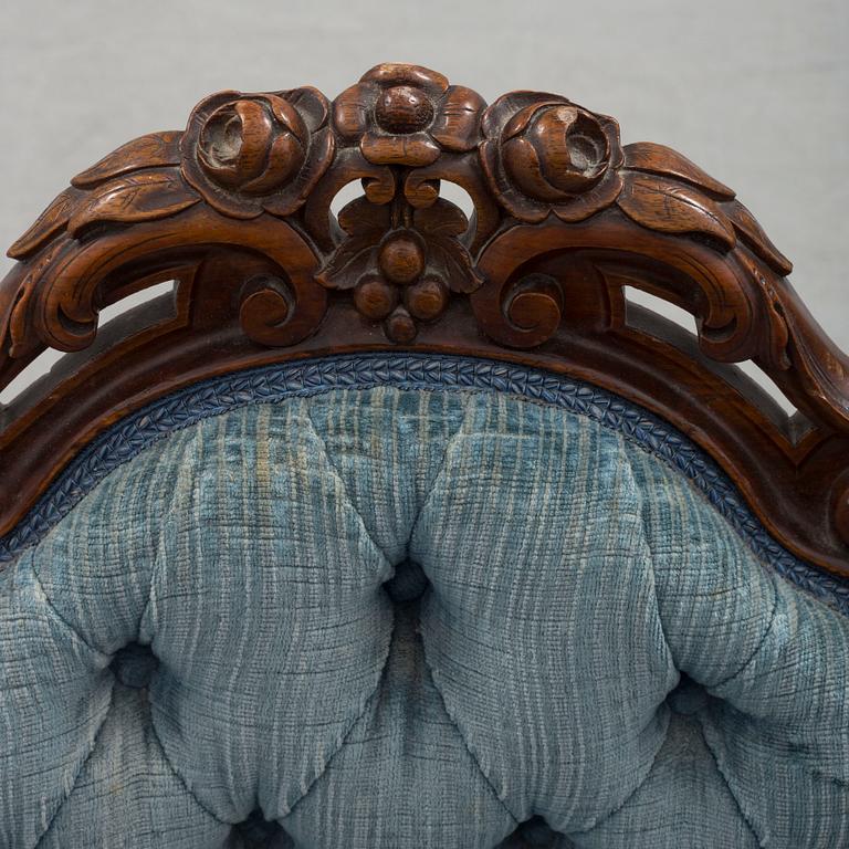 Six late 19th century walnut chairs.