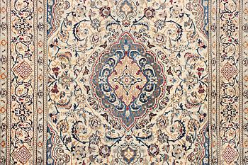 A Nain carpet, part silk, 9 laa, c. 300 x 195 cm.