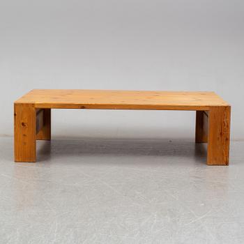A 1960s pine coffee table.