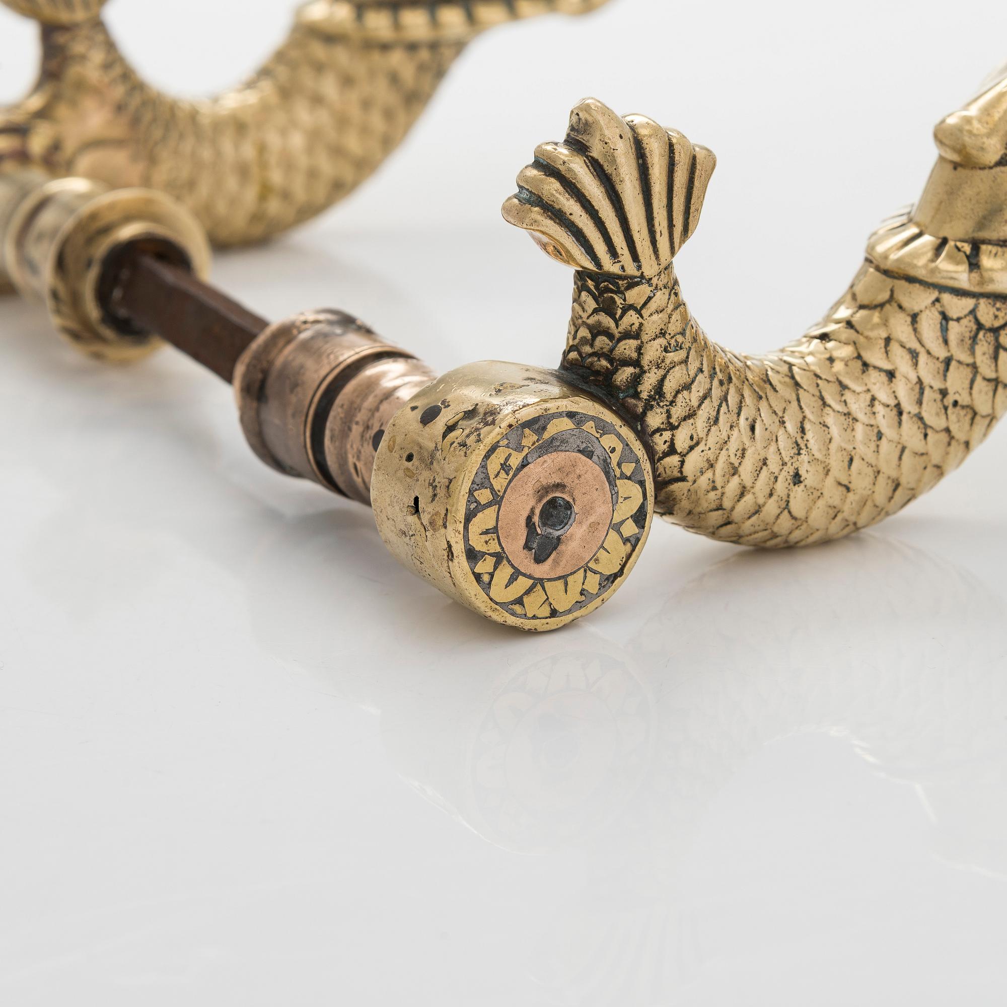 Armas Lindgren, A pair of 1920s brass door handles.