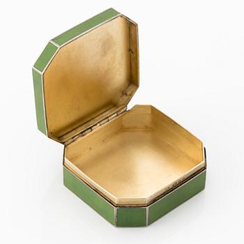 A rare silver and opaque green enamel pill box, Moscow 1912-1917.