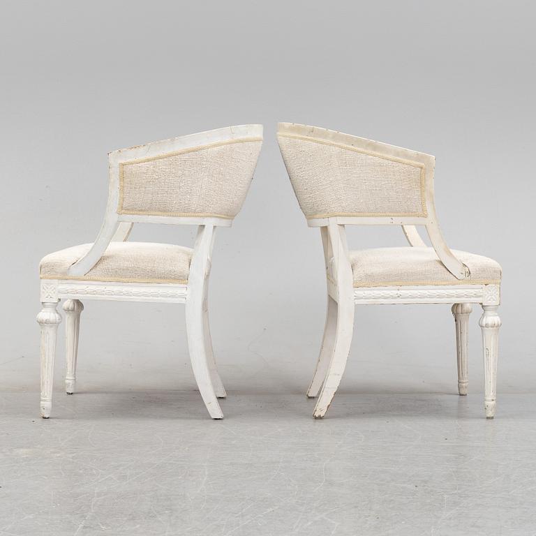 A pair of Gustavian style armchairs from around year 1900.