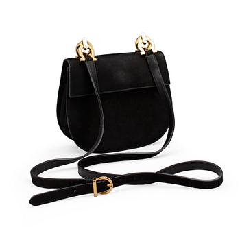 SALVATORE FERRAGAMO, a black suede shoulder bag.