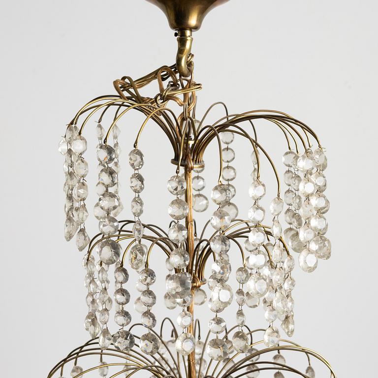A four-light Gustavian-style chandelier, circa 1900.