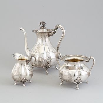 A 3 part silver coffee service dated 1937.