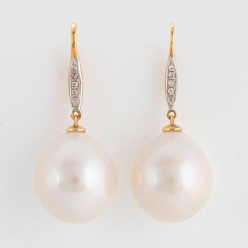 Cultured freshwater pearl and diamond earrings.