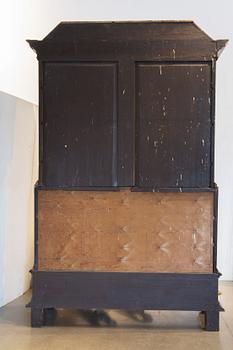 An early 18th century Chinese style cupboard.