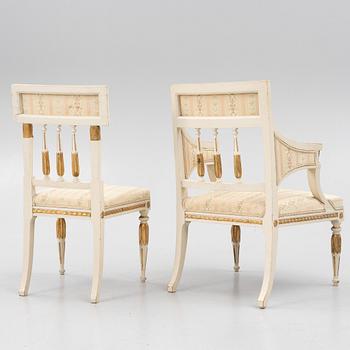 A pair of chairs and an armchair, late Gustavian style, early 20th century.