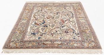 A carpet, semi-antique Esfahan, part silk, signed Eshan doust, ca226,5 x 126 cm.