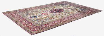 An antique Isfahan rug, Central Persia, c. 219 x 143 cm.