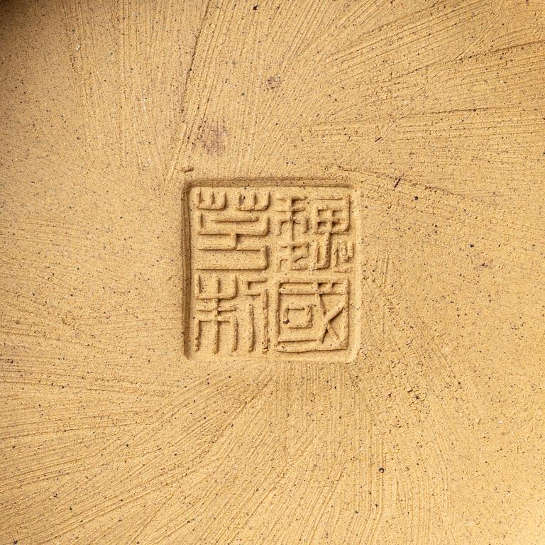 A group of three bright yellow yixing 'Gongfu' teapots, China, 1990s.