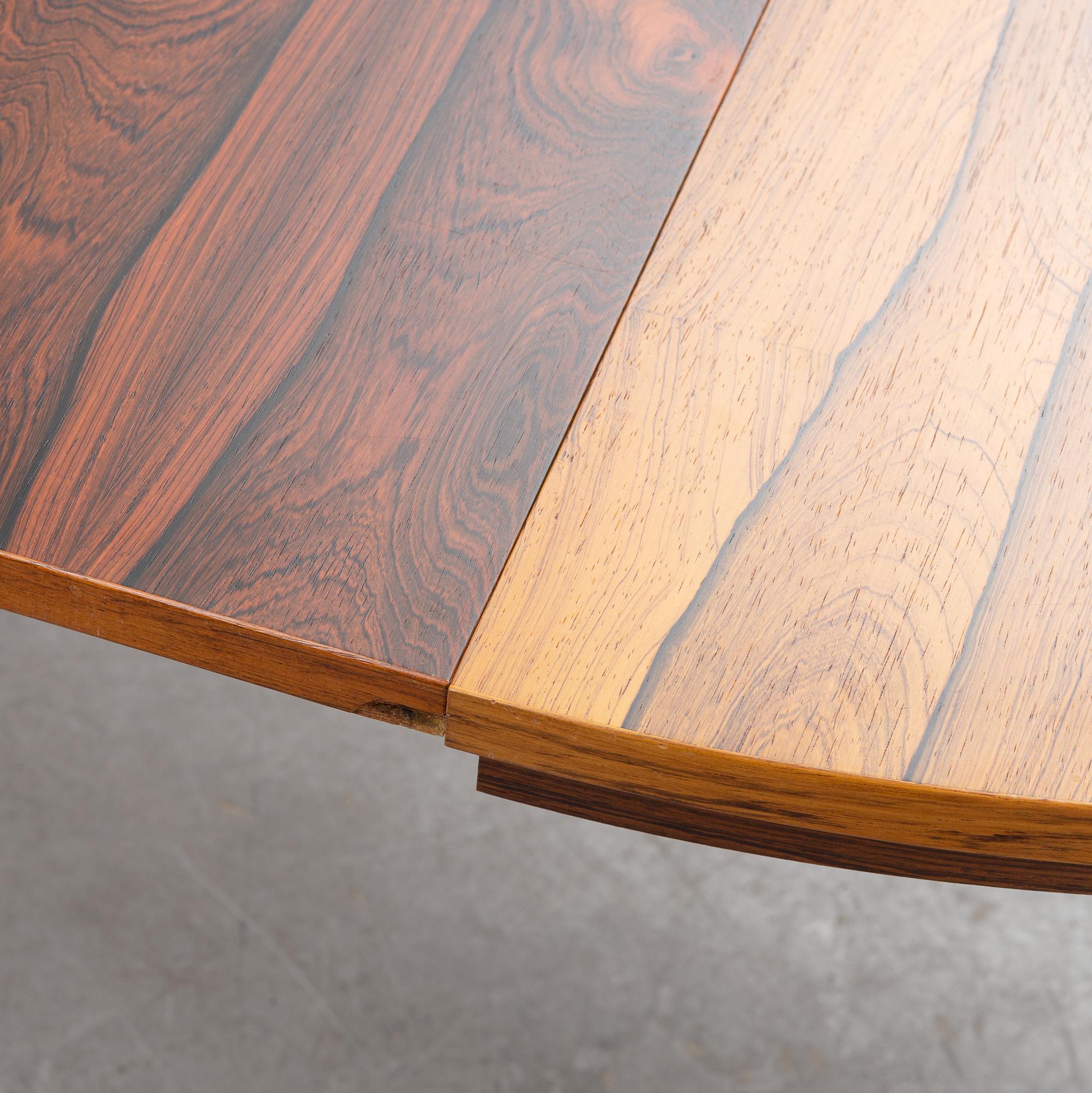 A rosewood dining table, 1970's.