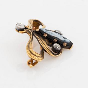 A Fedor Lorie brooch in gold and silver with a hardstone cameo and old-cut diamonds.