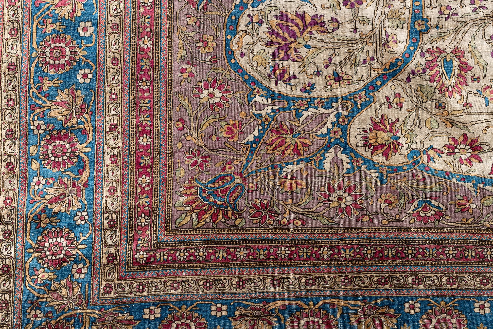 An antique silk Kashan 'Mohtasham', c. 297 x 216 cm.