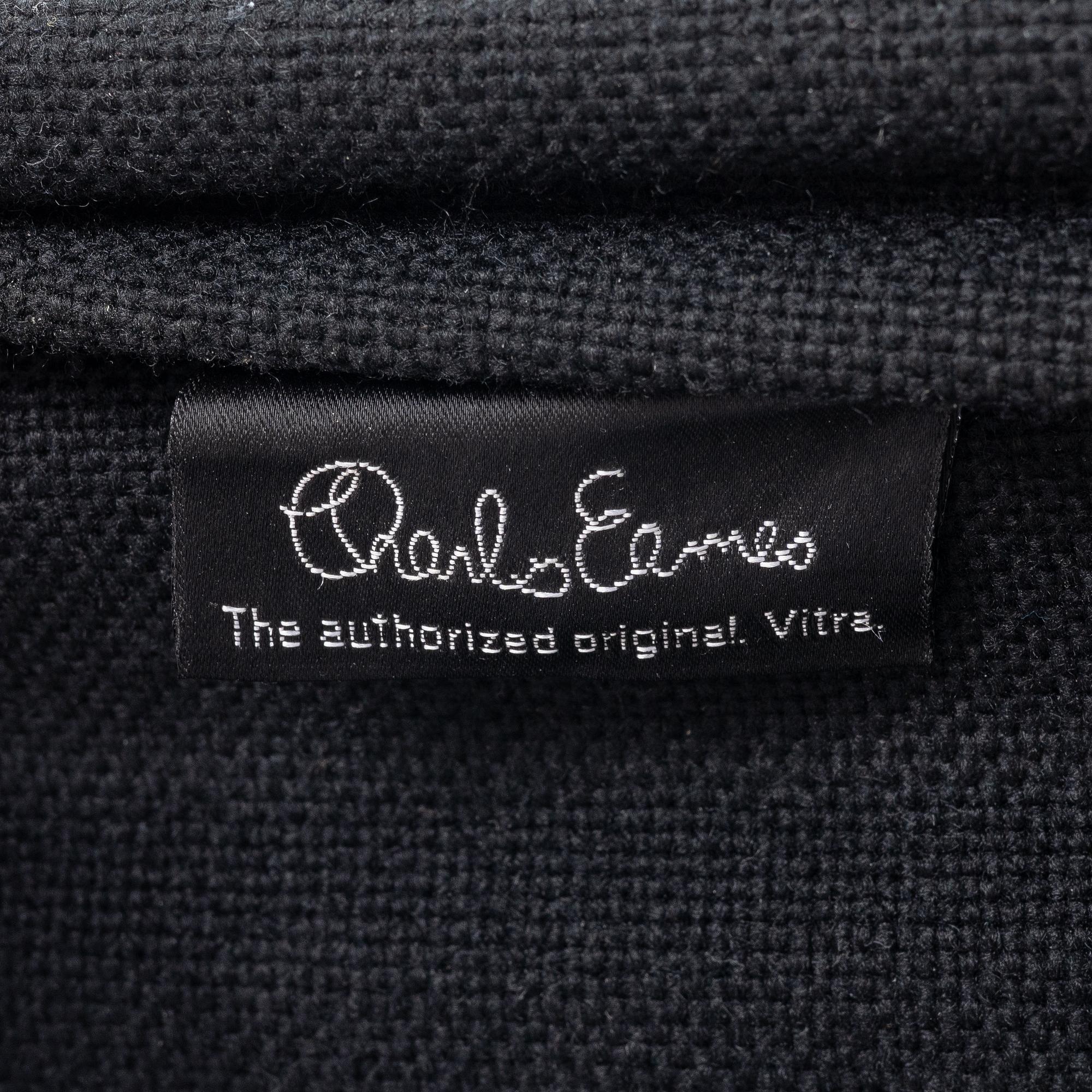 Charles & Ray Eames, A pair of EA 108 armchairs, Vitra.