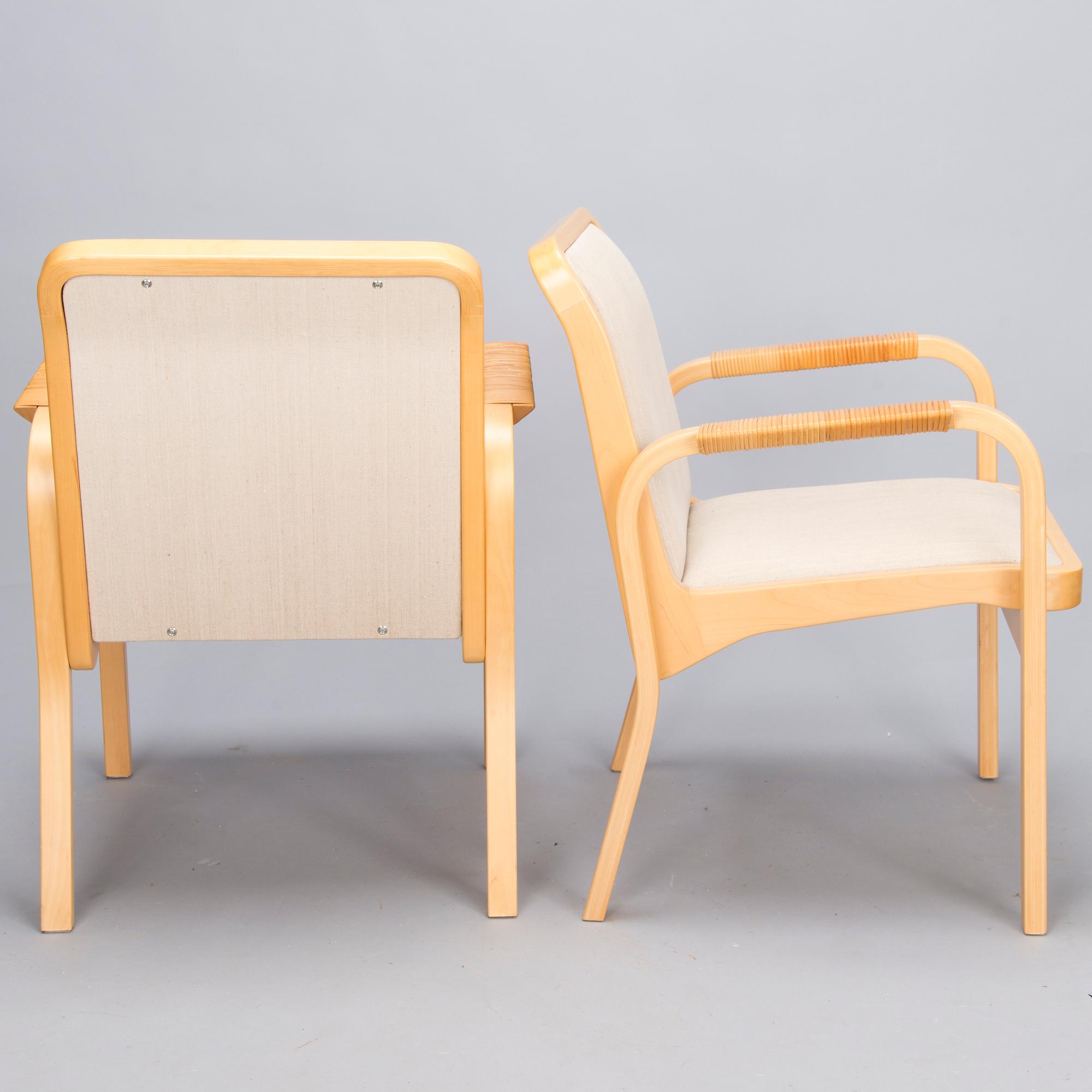 ALVAR AALTO, Pair of model 'E45' armchairs for Artek, late 20th Century.