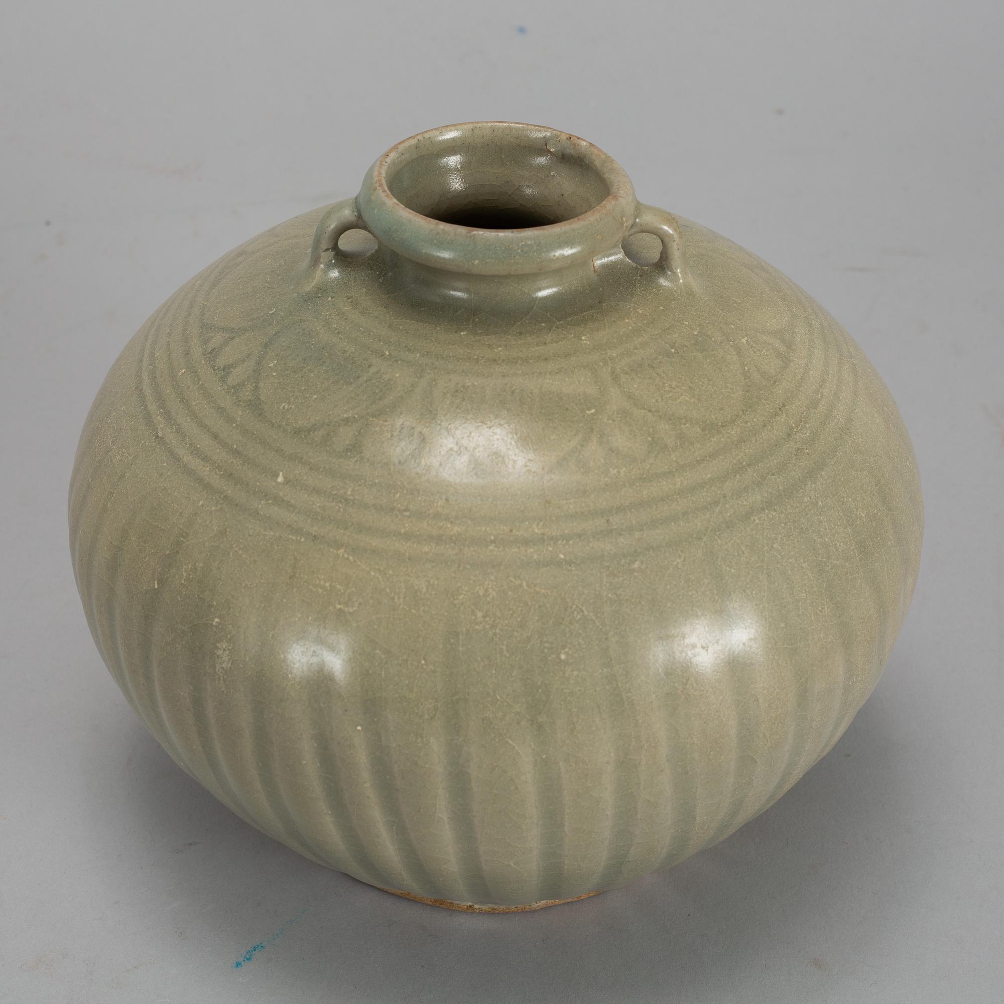 A cleadon glazed Sawnkhalok jar, South East Asia, 16th Century.