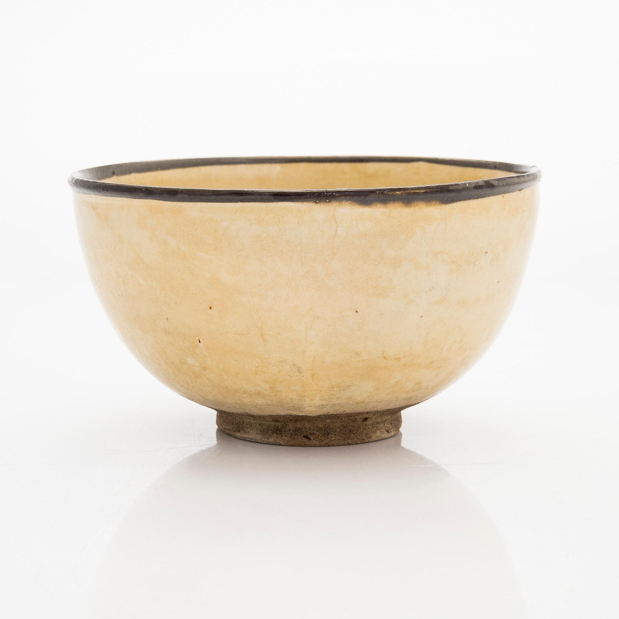 A creme glazed bowl, presumably Song/Yuan dynasty.