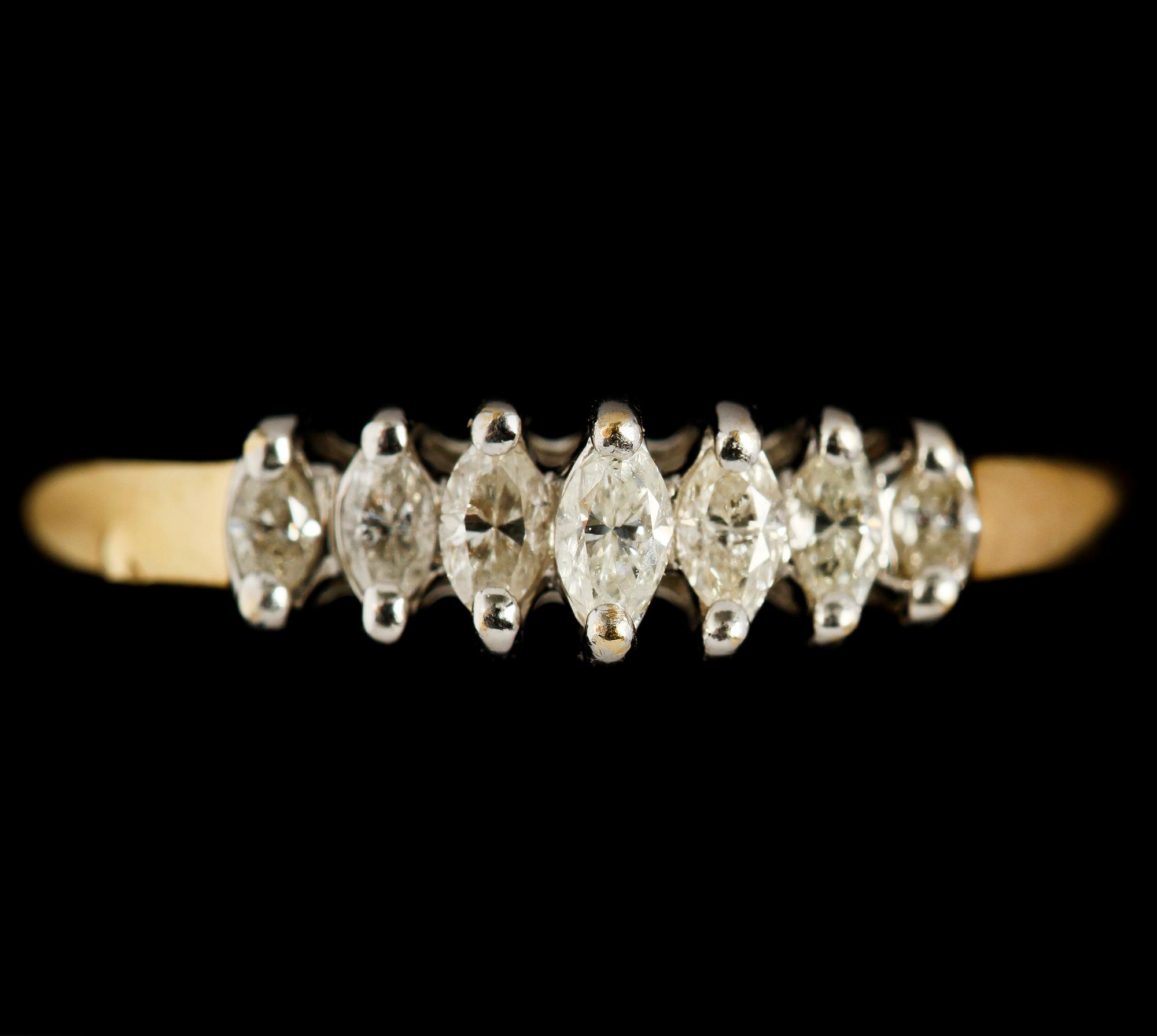 RING, 14k guld med 7 navetteslipade diamanter. Tot vikt 0.25 ct. Vikt 3 g.