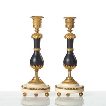 A pair of Louis XVI late 18th century candlesticks.