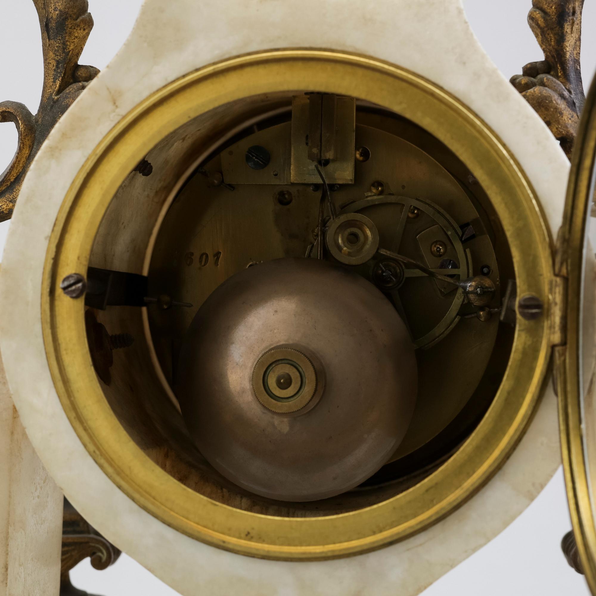 An end of the 19th century alabaster table clock.