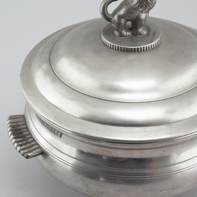 A lidded pewter terrine, model 277, Firma Svenskt tenn 1926. The lion probably designed by Anna Petrus.