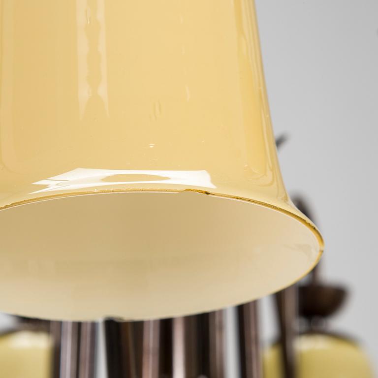 A 1940s-50s nine-arm pendant ceiling light.