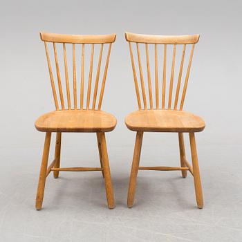 A pair of 'Lilla Åland' chairs by Carl Malmsten, second half of the 20th century.